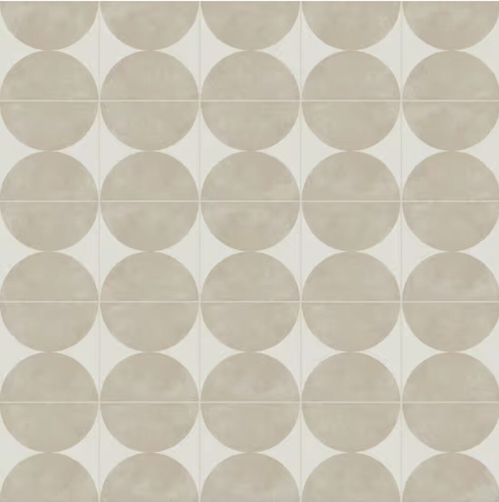 Circle-pattern tile in warm neutrals selected for the primary bath floor at 5507 E Pinchot