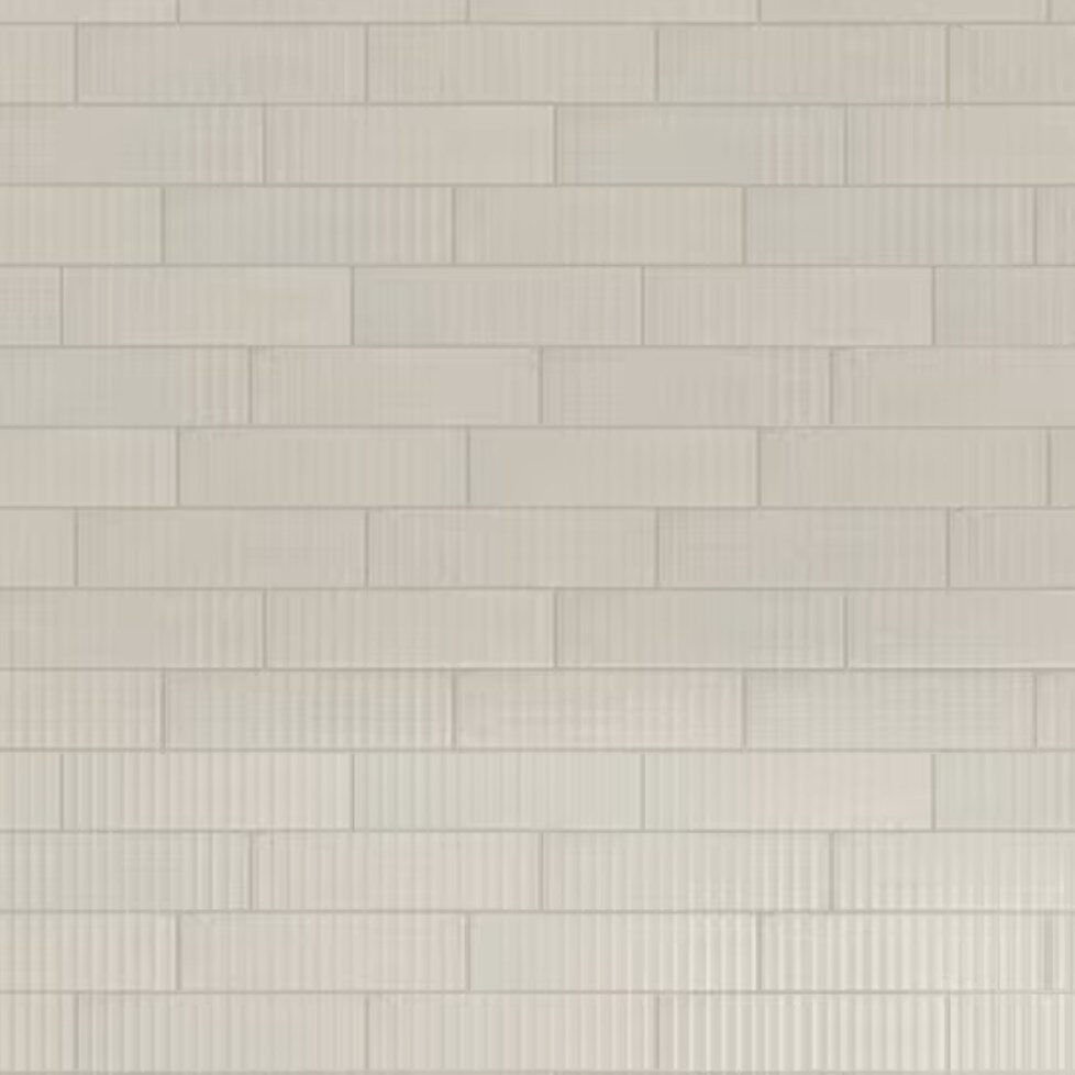 Light fluted tile selected for the primary shower walls at 5507 E Pinchot